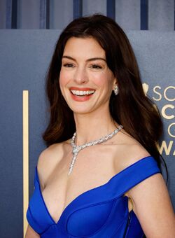 Anne Hathaway cleavage in blue dress at 30th Annual Screen Actors Guild Awards